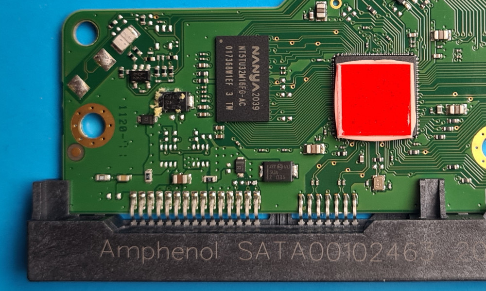 Close-up of WD WD40EFRX Hard Drive controller board underside showing power diodes